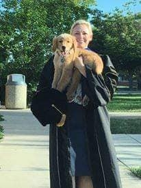 Krista Vince Garland holding dog